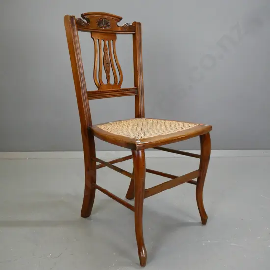 vintage mahogany Sheraton-revival cab leg side chair with shaped crest over lyre shaped pierced back splat,