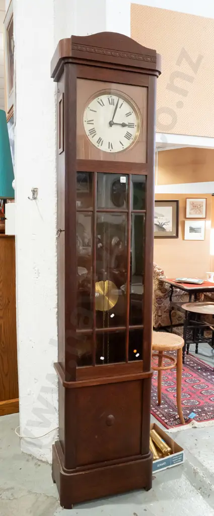 German Art Deco-style oak long-case clock, shaped top w/ band of pressed lozenge decoration, glazed opening door w/ 9 Image 1++