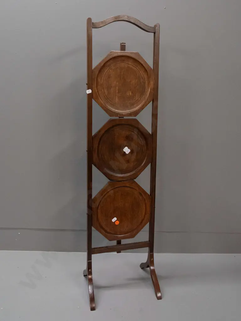 vintage mahogany 3-tier folding cake plate stand with octagonal plate supports. Has had small repair to one leg. H-960 Image 1++