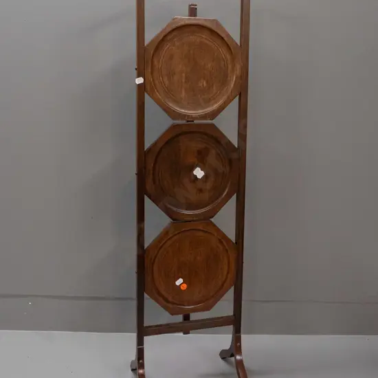 vintage mahogany 3-tier folding cake plate stand with octagonal plate supports. Has had small repair to one leg. H-960