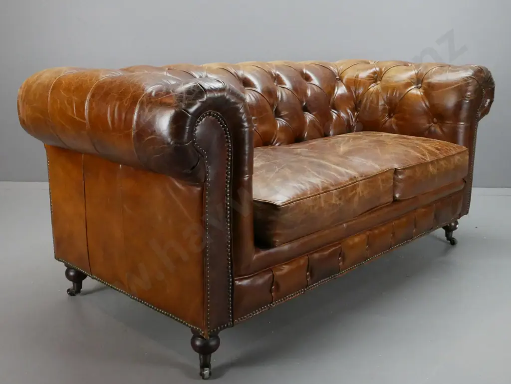 brown leather deep button and pleated rolled-arm chesterfield 2-seater settee with brass studded front and sides, on Image 1++