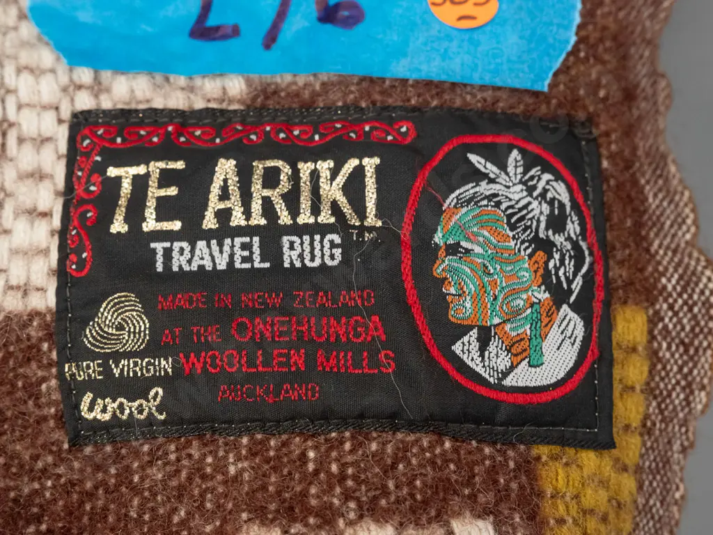 retro travel rug with Te Ariki / Onehunga Woollen Mills Auckland label - has small cut or hole near edge Image 1++