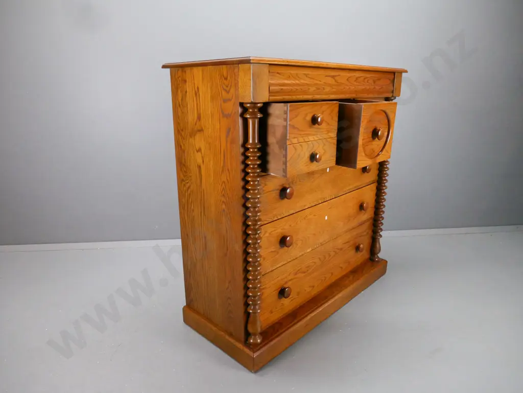 oak NZ-made reproduction Victorian style 8-drawer chest with wooden knobs, bobbin-turned pilasters H-1260 W-1220 D-530 Image 1++