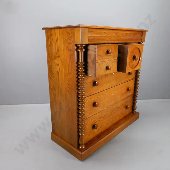 oak NZ-made reproduction Victorian style 8-drawer chest with wooden knobs, bobbin-turned pilasters H-1260 W-1220 D-530