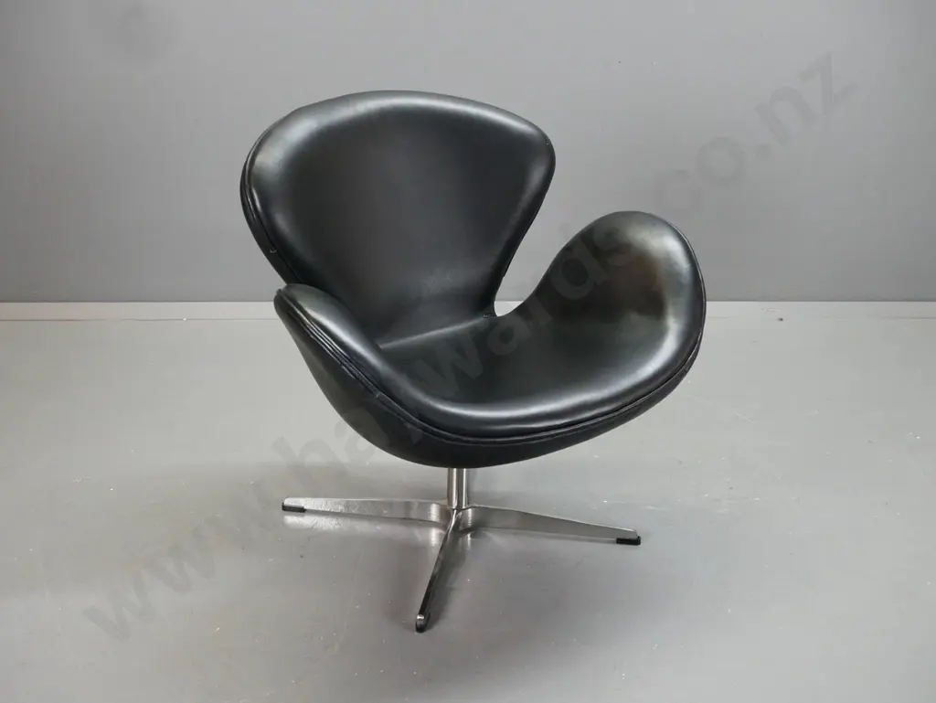 Arne Jacobsen style black leather swan chair on chrome X-frame base, piped edging - minor scratches and scrapes to Image 1++