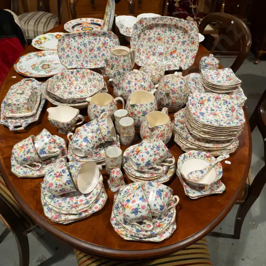large assortment of Royal Winton "Old Cottage Chintz" all-over-floral table ware - 11 cups, varied jugs, sugar bowls,