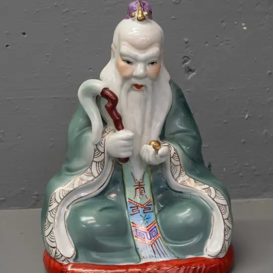 Chinese seated male figure with ceremonial items - hand painted porcelain with gilded highlights, no maker's marks H-300