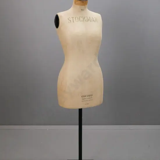 vintage dressmakers' female torso size 46, marked Stockman Paris London, on revolving black-painted metal stand, some