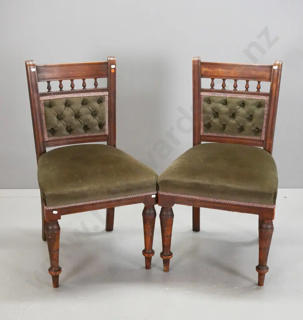 pair of colonial kauri side chairs, upholstered deep button back and seat, turned front legs, original combed finish. Image 1++