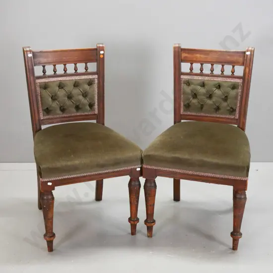 pair of colonial kauri side chairs, upholstered deep button back and seat, turned front legs, original combed finish.