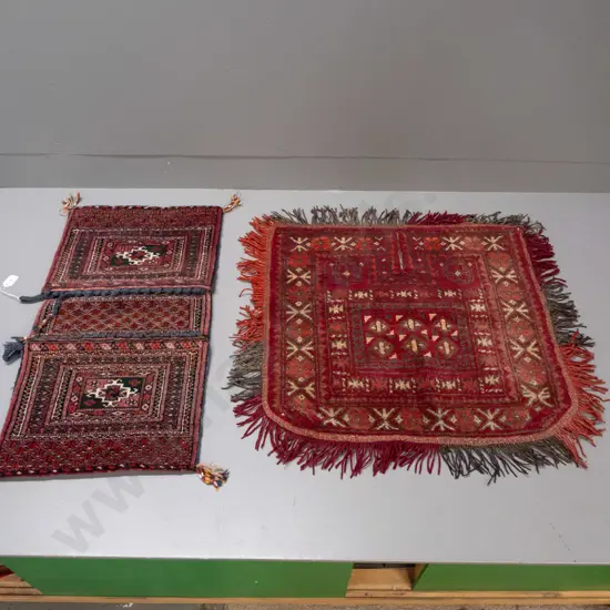 2 Turkish / tribal style hand-knotted wool items - small frilled rug with cutout slot and double-sided small saddle bag,