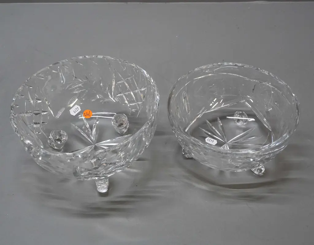2 cut crystal 3-footed bowls, slightly different sizes, both w/ etched flowers, no maker's marks, larger is H-110 D-200 Image 1++