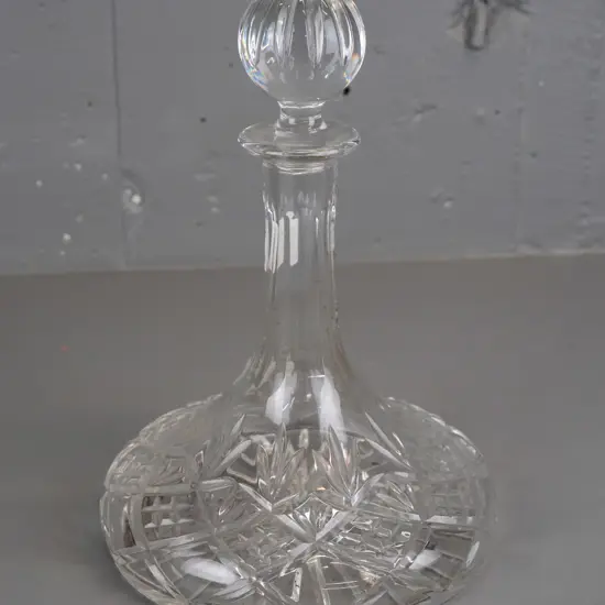 Royal Doulton cut crystal stoppered ship's decanter with label - some staining inside. H-290 D-190 at widest