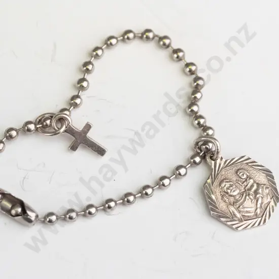 babys silver bracelet with medalion & cross stamped 925