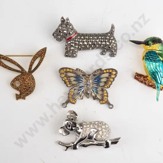 5 costume brooches