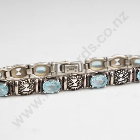 sterling silver 8 blue topaz oval & marcasite bracelet