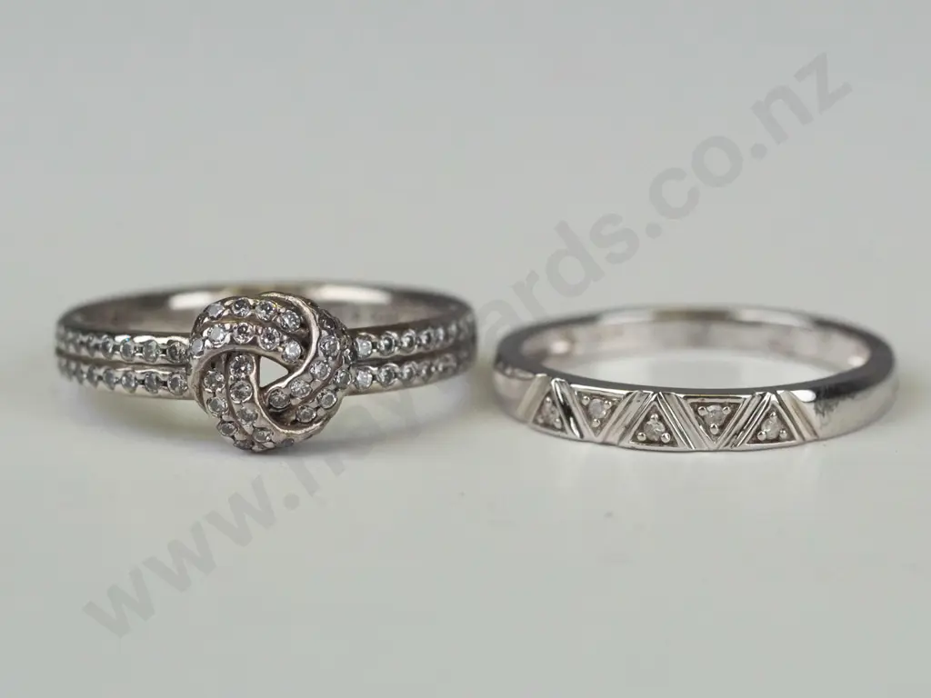 2 silver cz rings both stamped 925 Image 1++