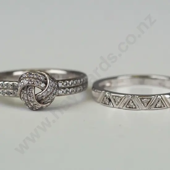 2 silver cz rings both stamped 925