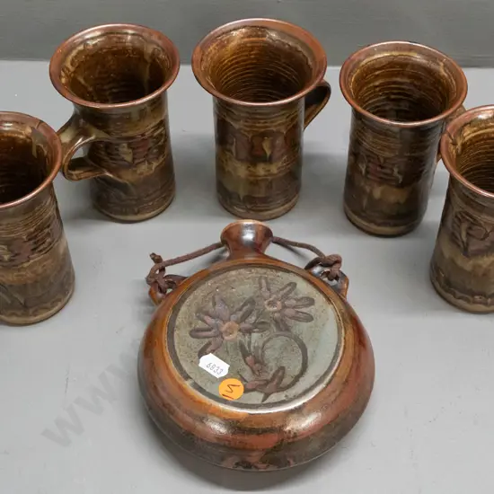 6 pieces of New Zealand studio pottery - 5 mugs with unknown maker's mark and a wall hanging flask by Jane Gregory -