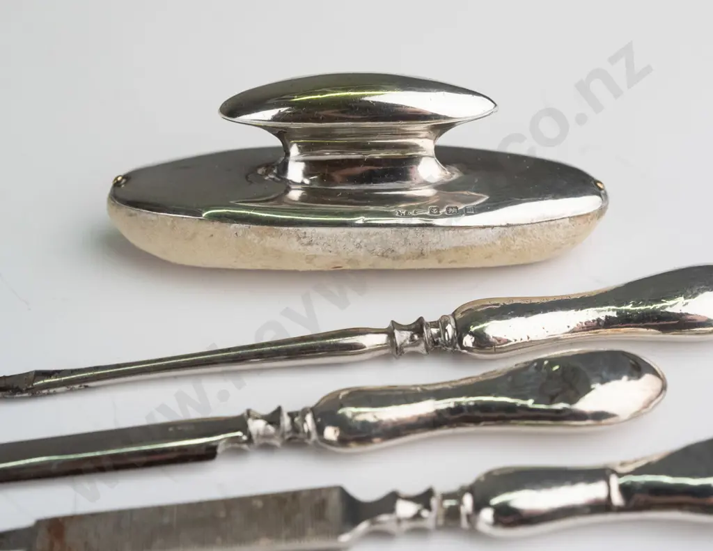 silver manicure set marked with anchor, lion, M & silver pipe mouth piece container with mouth piece engraved from the Image 1++
