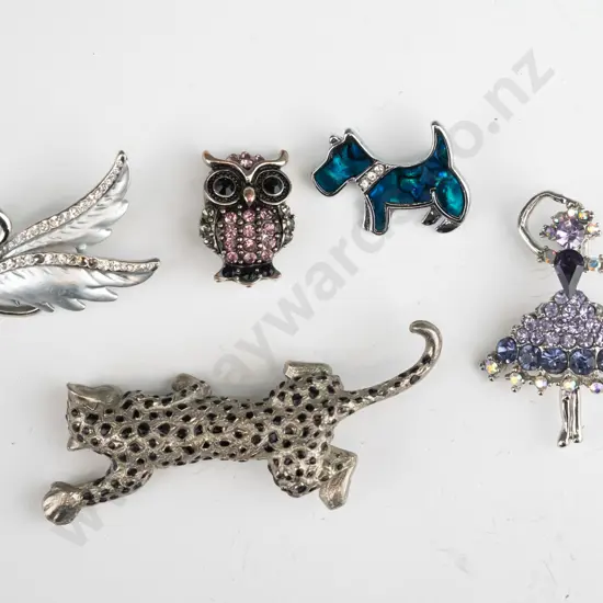 5 costume brooches