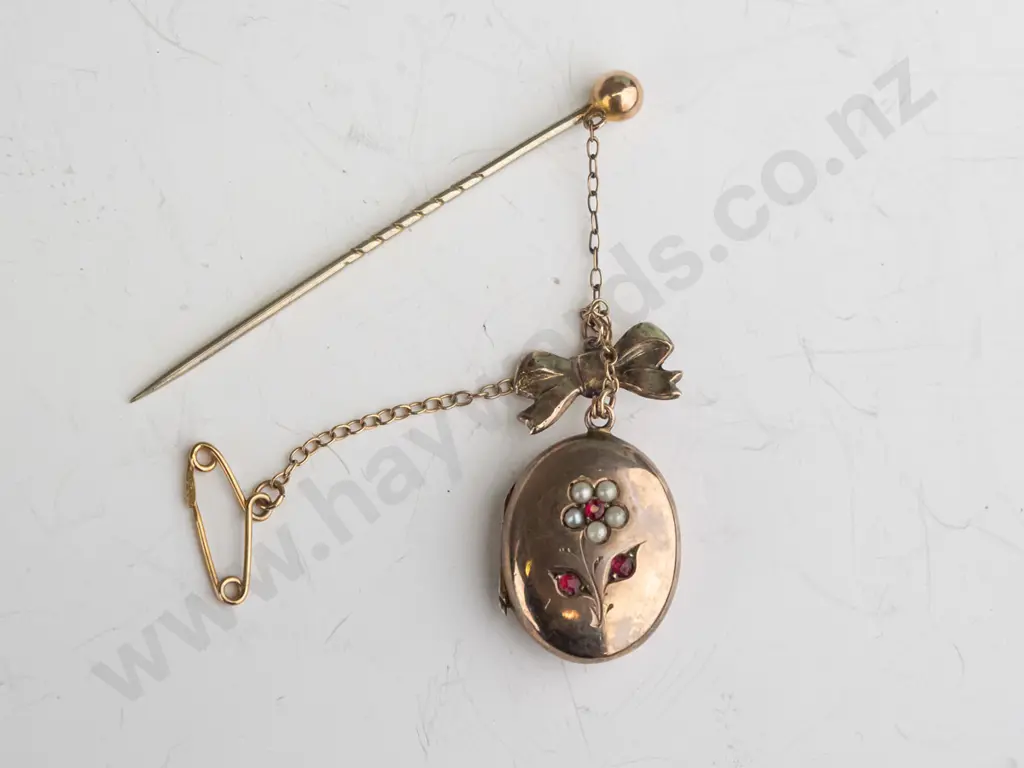 9ct locket with bow set pearls & red stones lapel stick pin & safety chain Image 1++