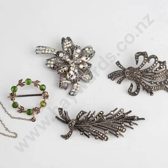 4 costume brooches
