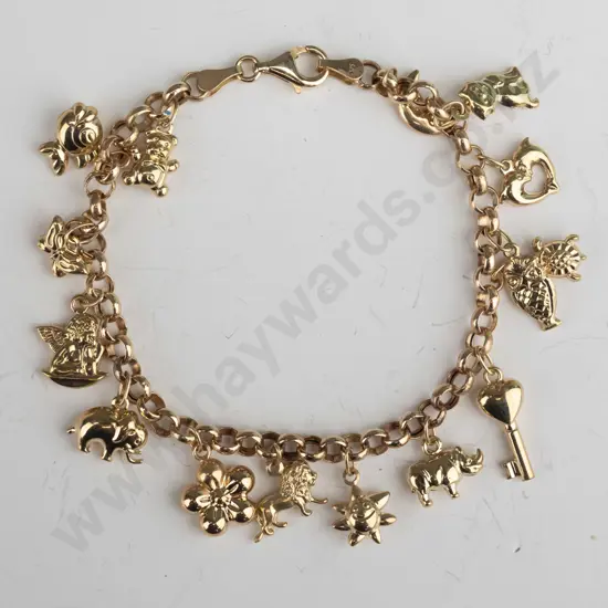 gold charm bracelet stamped 375  7gms