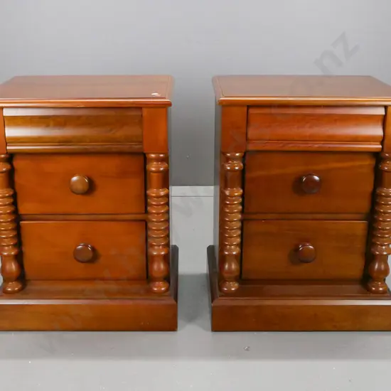 pair of reproduction colonial style beech bedside chests w/ shaped top drawer, wooden knobs on others, turned pilasters,