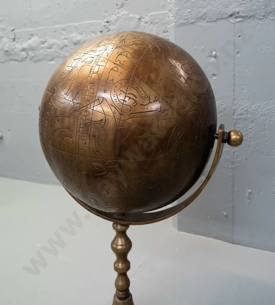 very heavy brass globe on rotating mount and stem, on circular base - globe is incised with script, animal and human Image 1++