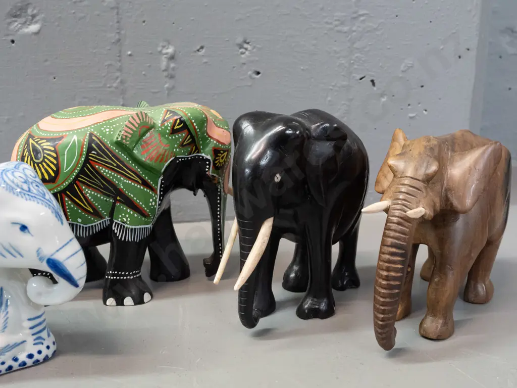 5 ornamental elephants - carved ebony, carved teak, clear glass with frosted base, blue and white coin bank and one Image 1++
