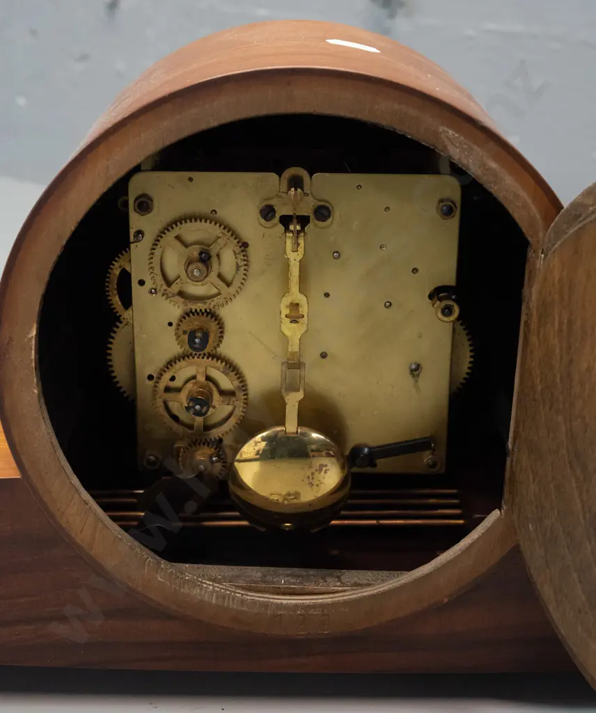 mid-century "Baduf" wood cased mantel clock with teak veneer and applied brass stringing, pressed brass & painted face. Image 1++