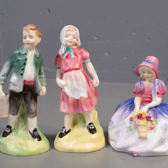 3 small Royal Doulton figures - Jack & Jill pair and "Monica" seated figure. Jill is H-140.