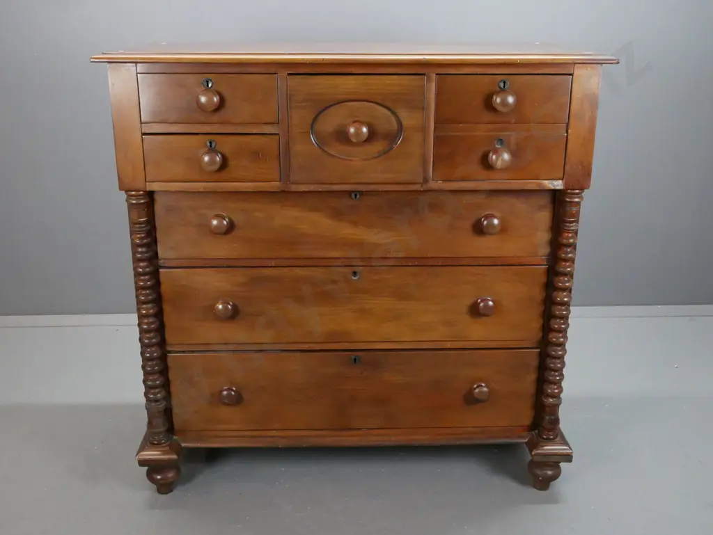 early colonial kauri break-front 7 drawer chest w/ bobbin-turned pilaster supports & turned wooden knobs, circular Image 1++