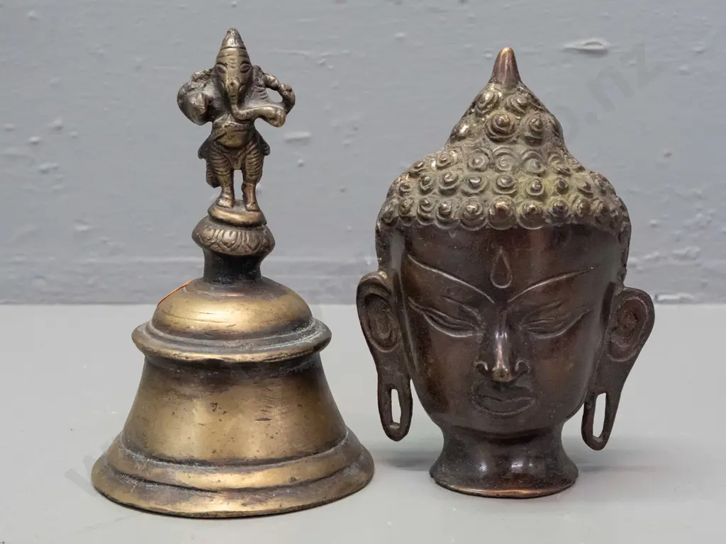 cast metal bell with elephant deity handle and a hollow cast metal Buddha head H-130 Image 1++