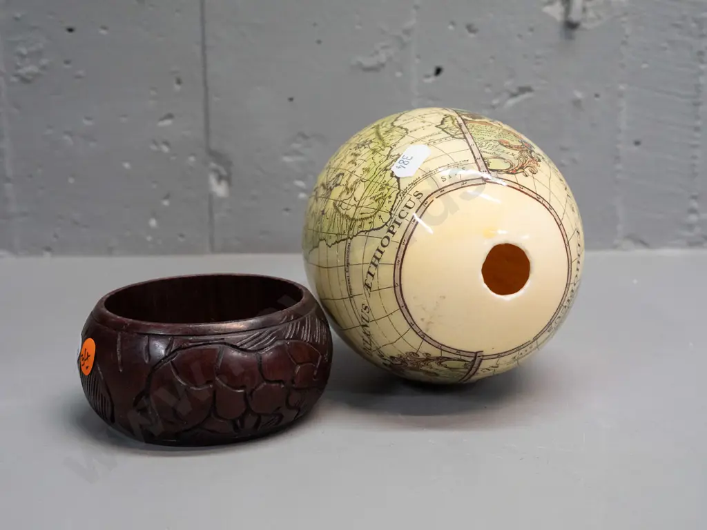 ostrich egg with transfer overlay on African animals and map on carved wood ring base with animal motifs. Combined H-200 Image 1++