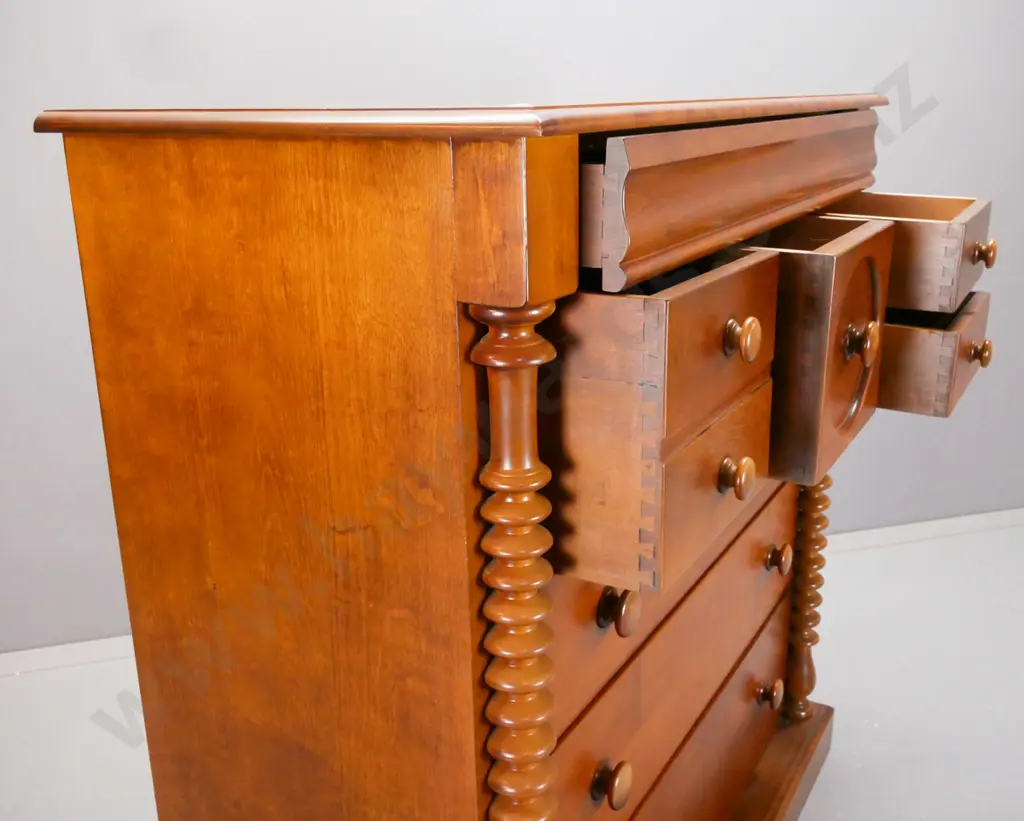 reproduction colonial style beech 8-drawer chest w/ shaped top drawer, wooden knobs on others, turned pilasters, on Image 1++