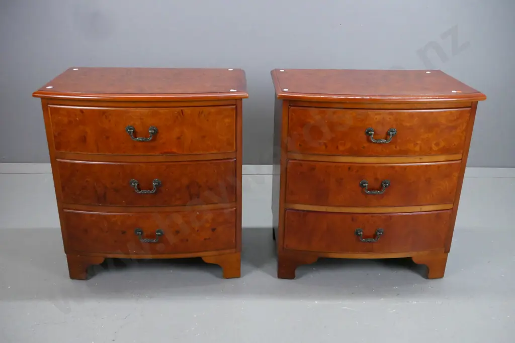 pair  3-drawer bow front bedside chests - rimu w/ burr elm veneer top and fronts, cast metal drop handles, RA & CR Image 1++