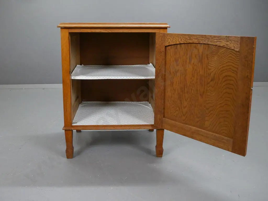 vintage arts & crafts style oak bedside cupboard with panelled door with transfer decoration, drop handle with diamond Image 1++