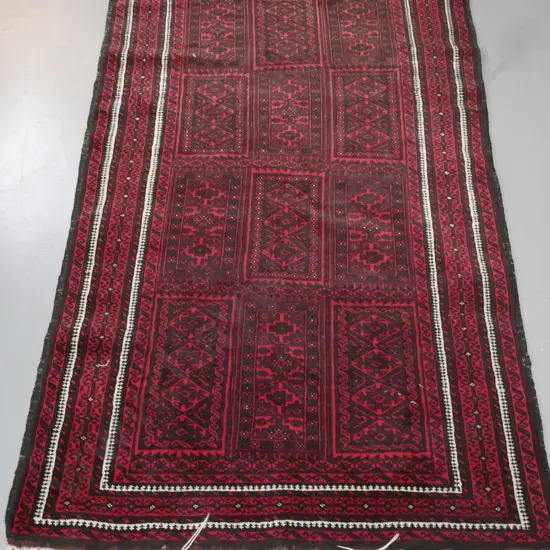 persian style hand knotted wool floor rug with geometric panels and motifs - dark red, black and light brown. L-2050