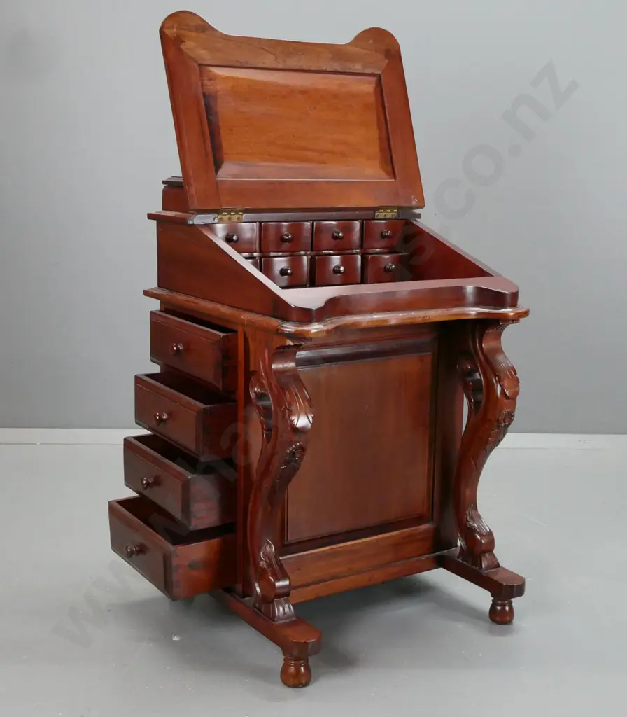reproduction mahogany Victorian-style Davenport desk with inlaid leather writing surface, 8 interior drawers, carved Image 1++