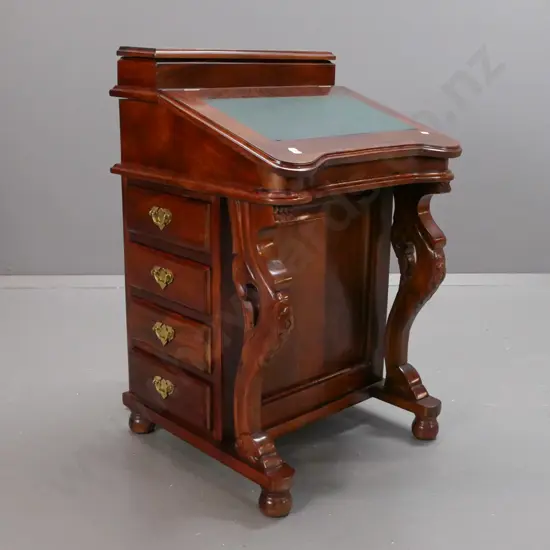 reproduction mahogany davenport desk, lift-up stationery box on top, slanted lifting top w/ green leather insert, top
