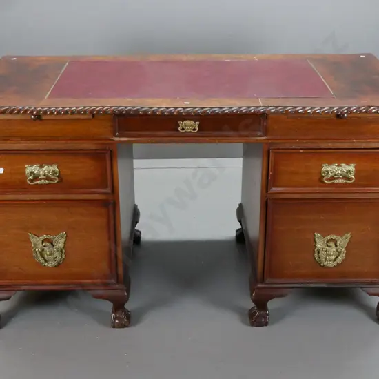 vintage Chippendale style mahogany double pedestal desk w/ figured walnut veneer top around leather inset writing