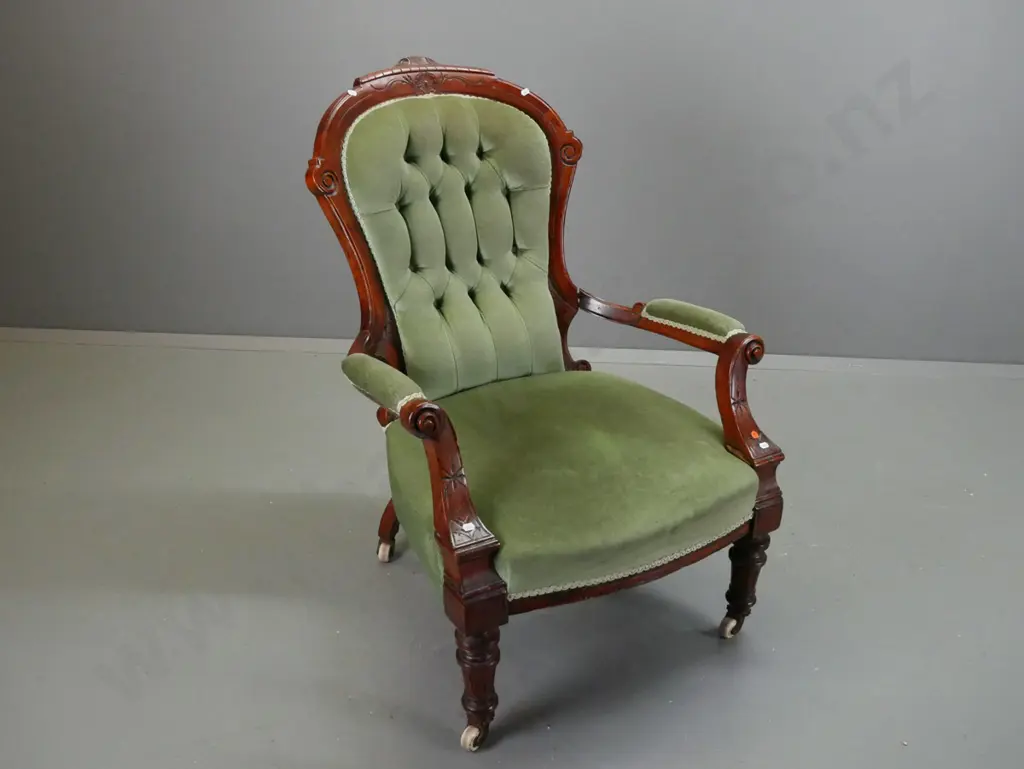 Victorian walnut open-arm gent's chair with carved shaped back, turned fluted legs, deep button back, porcelain & brass Image 1++
