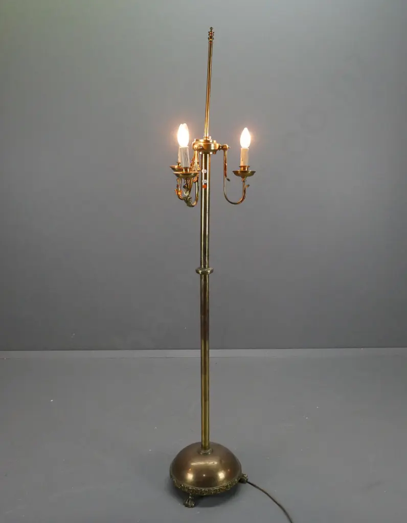 brass standard lamp with 3 curved arms holding upturned light fittings, circular base with 3 lion's paw feet - stem is Image 1++