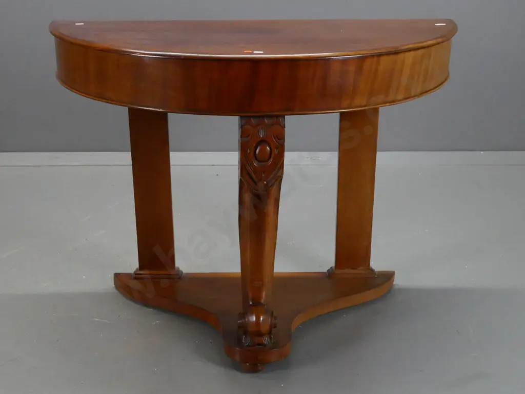 Victorian mahogany half round console table with cross-banded veneer front, central sweeping carved leg, platform base - Image 1++