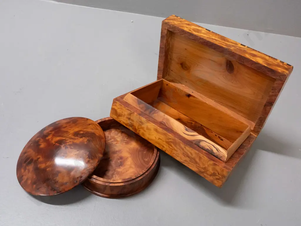 2 wooden boxes - burr totara circular with lift off lid and a rectangular burr wood box with diamond lattice pattern Image 1++