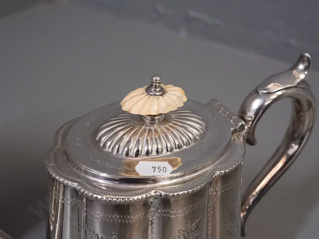 ornately etched plated ware - teapot with bakelite or plastic knob, scalloped body and a hinged lid canister with base Image 1++