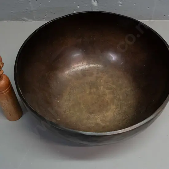 Tibetan singing bowl cast & beaten metal w/ finely etched Buddha motif decoration inside w/ ornate carved beater H-115