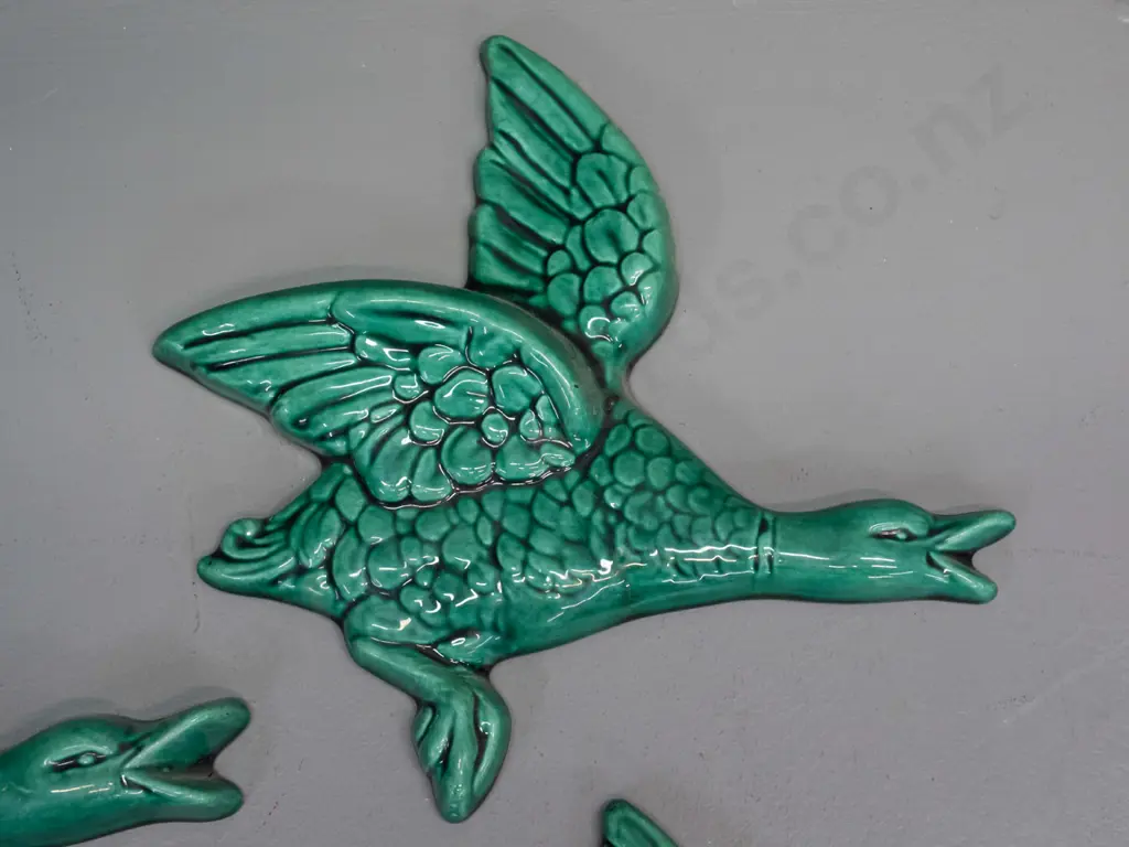 graduated set of 4 green-glazed flying ducks, no maker's marks, majolica style glaze - largest one has minor firing Image 1++
